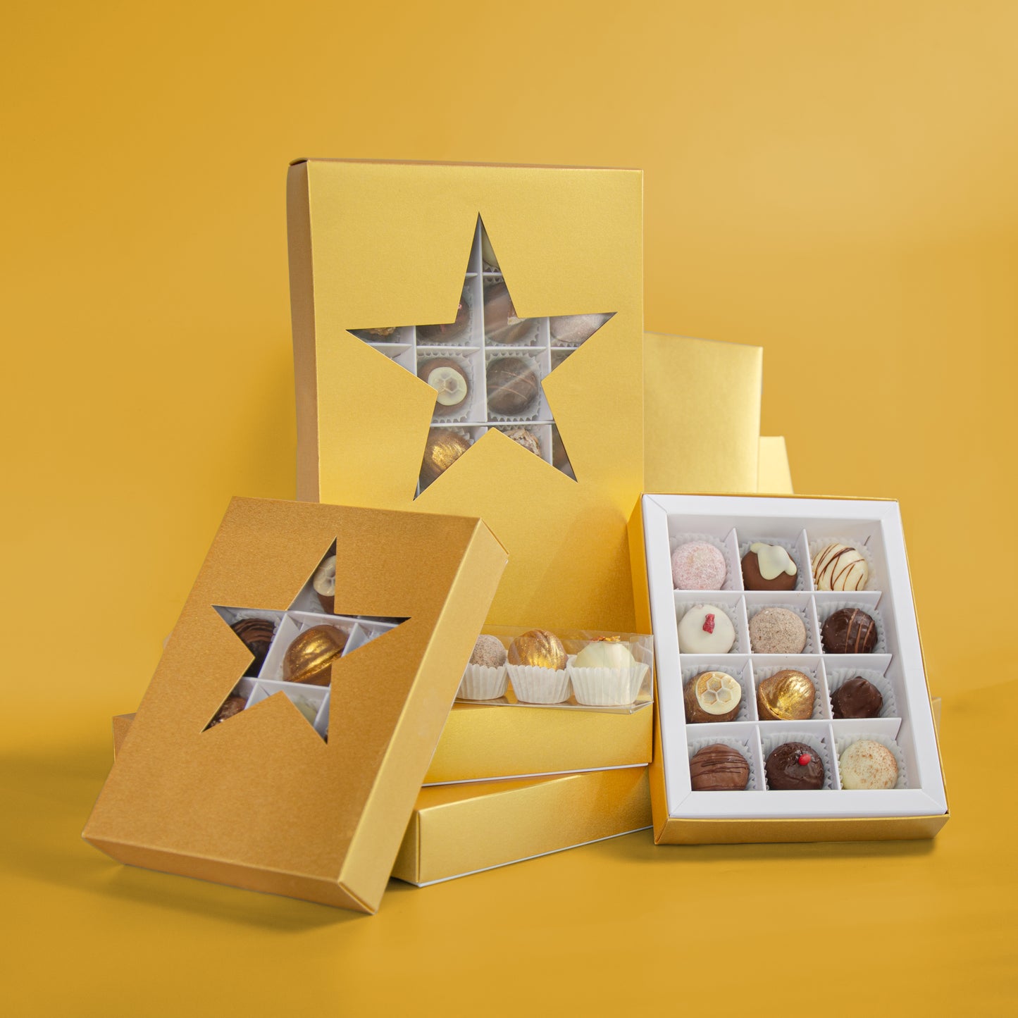 12er Pralinen Geschenkbox mit Goldsternmotiv