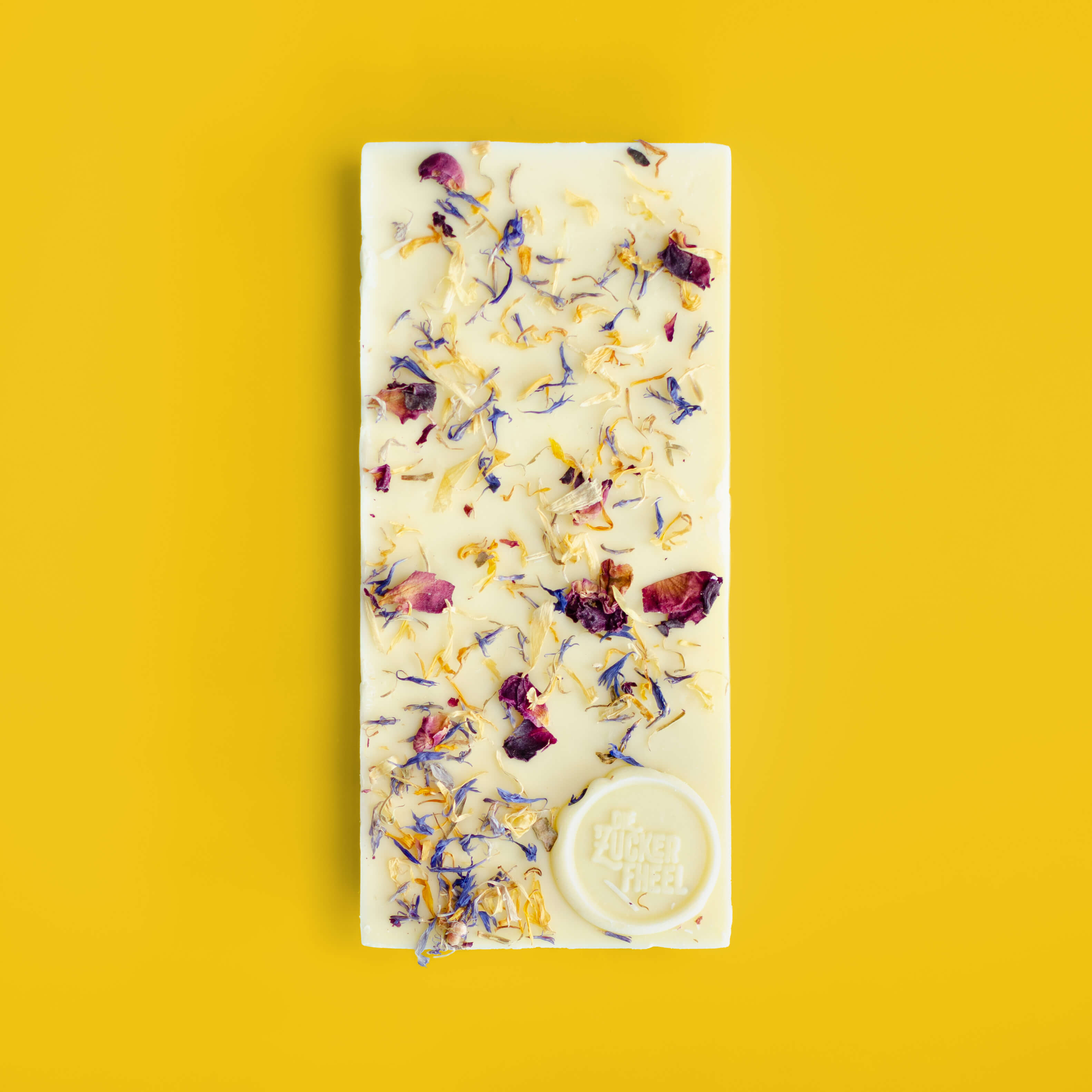 Weiße Schokolade mit Heublumen